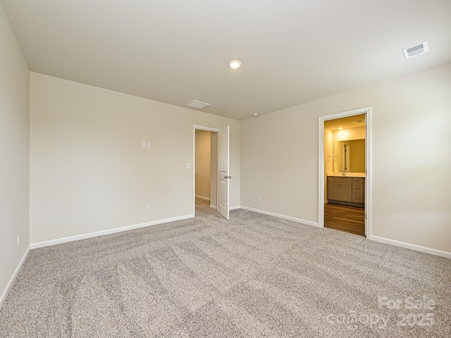 unfurnished room with carpet