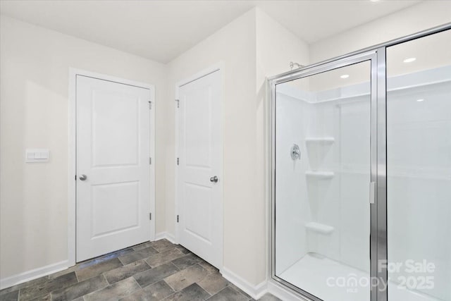 bathroom featuring an enclosed shower