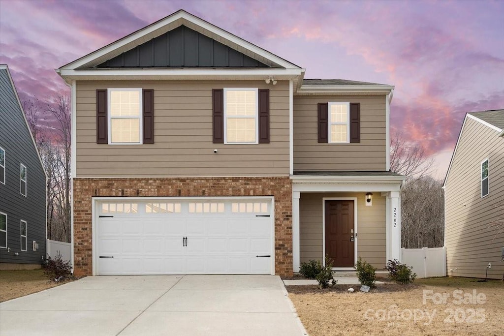 view of front of property with a garage