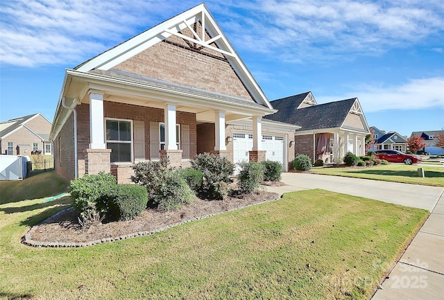 craftsman inspired home with a porch, a front yard, and a garage