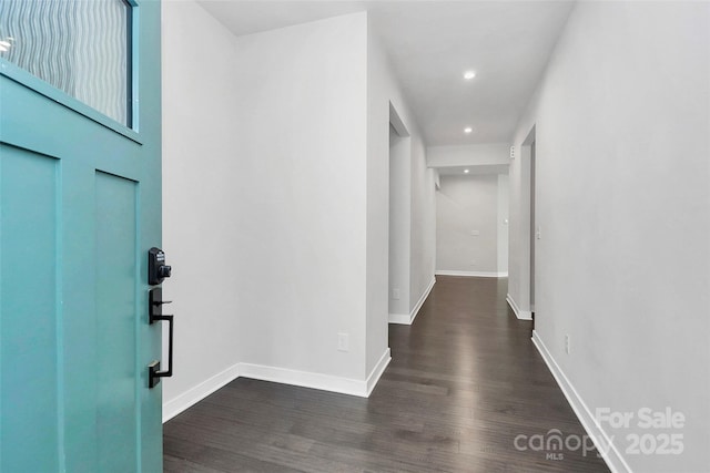 entrance foyer with dark hardwood / wood-style floors