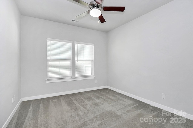 carpeted empty room with ceiling fan