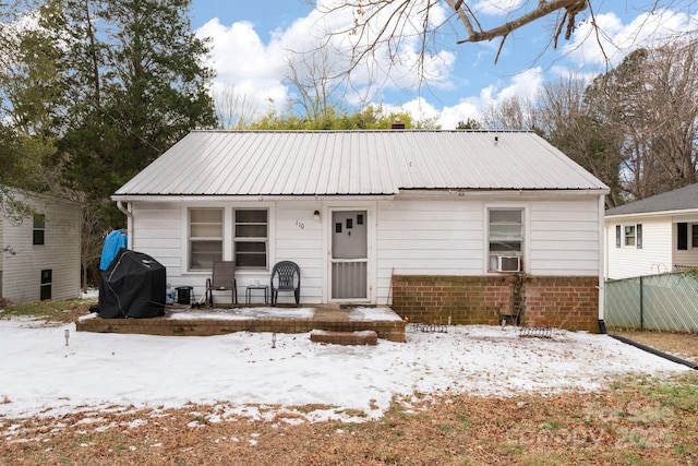 view of snow covered property