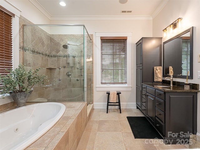 bathroom with ornamental molding, tile patterned flooring, vanity, and shower with separate bathtub