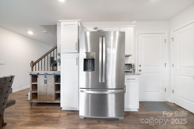 kitchen with white cabinetry, stainless steel fridge with ice dispenser, and dark wood-type flooring