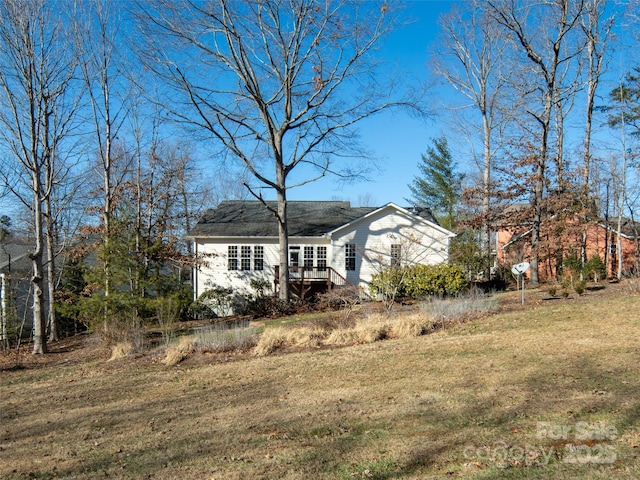 exterior space with a front yard