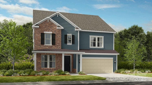 view of front of home featuring a garage and a front yard