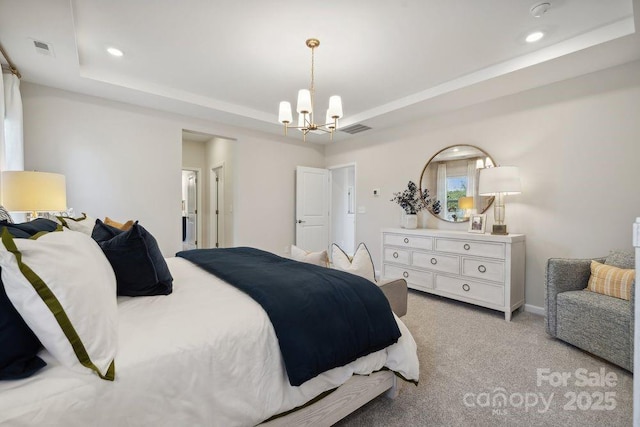 bedroom with light carpet, an inviting chandelier, and a raised ceiling