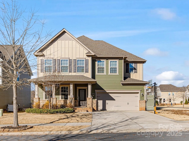 view of front of house featuring covered porch and a garage