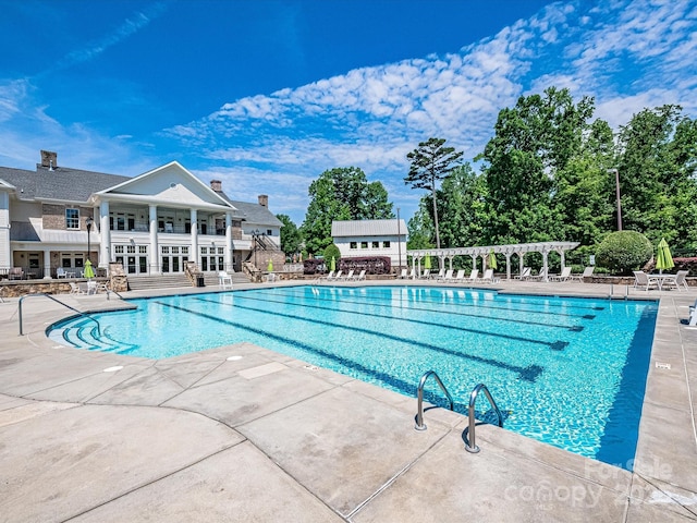 view of pool with a patio area