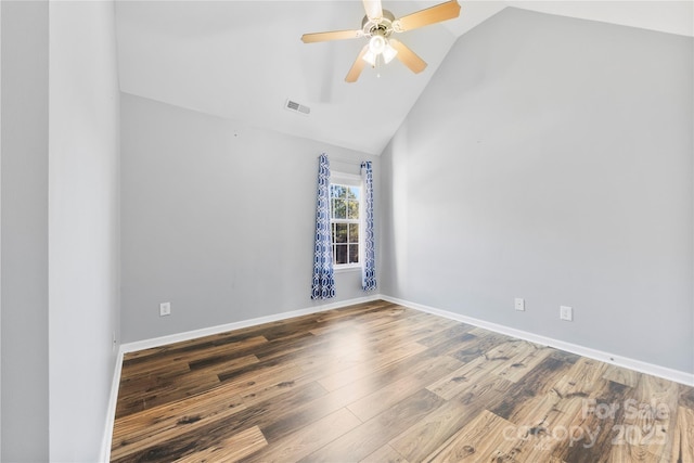 unfurnished room featuring ceiling fan, wood-type flooring, and vaulted ceiling