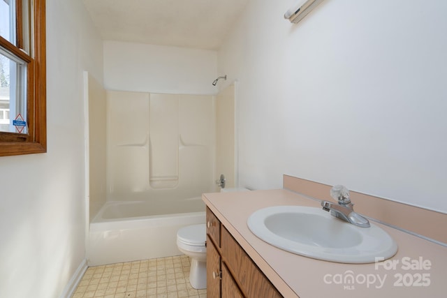 full bathroom featuring toilet, vanity, and  shower combination