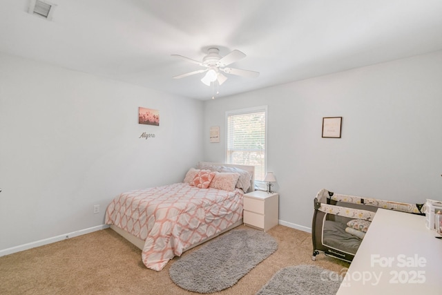 bedroom featuring light colored carpet, visible vents, ceiling fan, and baseboards