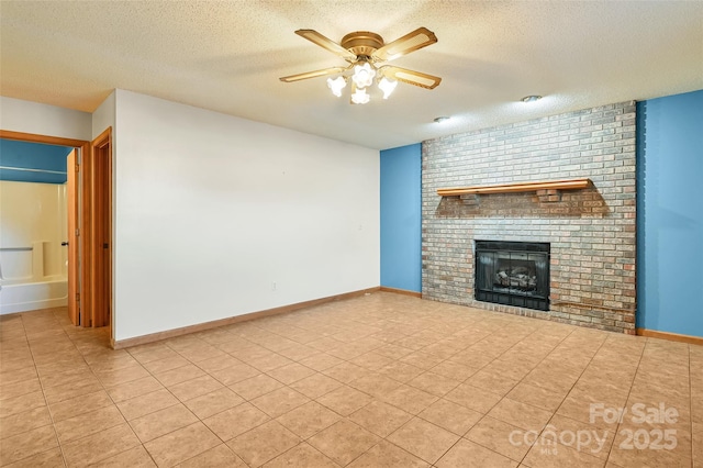 unfurnished living room featuring light tile patterned floors, a textured ceiling, a fireplace, and ceiling fan