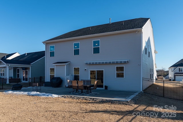 rear view of property with a patio