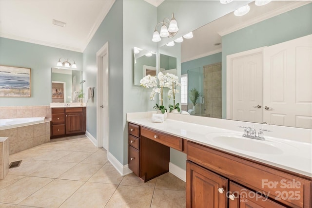 bathroom with a chandelier, vanity, tile patterned floors, ornamental molding, and separate shower and tub