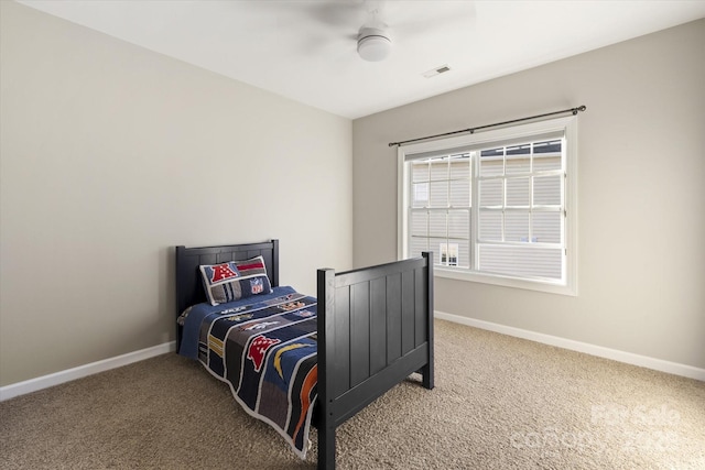 carpeted bedroom with ceiling fan