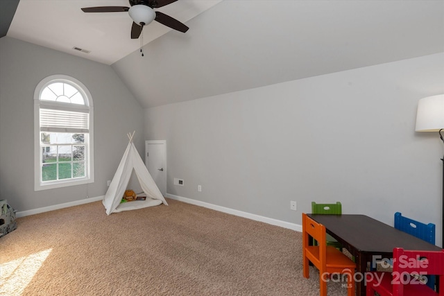 playroom featuring ceiling fan, carpet, and lofted ceiling