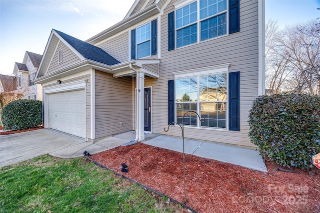 view of front of house with a garage