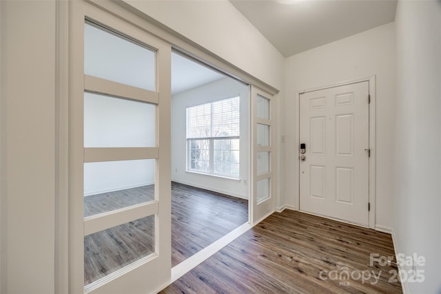 entrance foyer with hardwood / wood-style floors