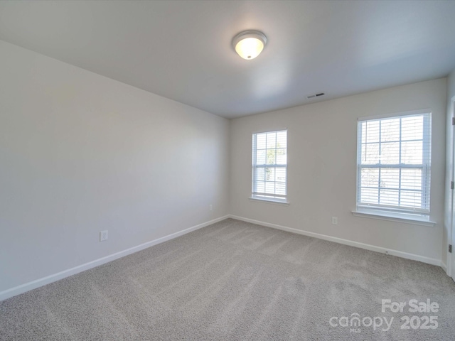 view of carpeted spare room