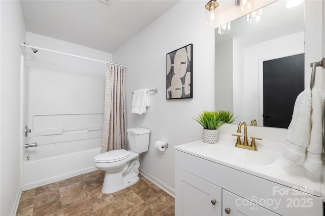 full bathroom featuring toilet, a textured ceiling, shower / bath combo with shower curtain, and vanity