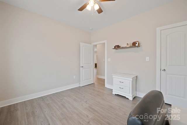 interior space with ceiling fan and light wood-type flooring