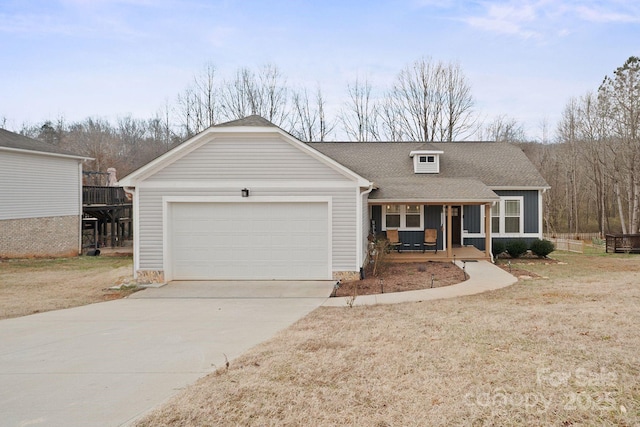 ranch-style house with a garage, covered porch, and a front lawn