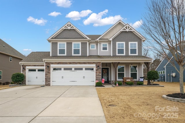 craftsman-style house featuring a porch and a garage