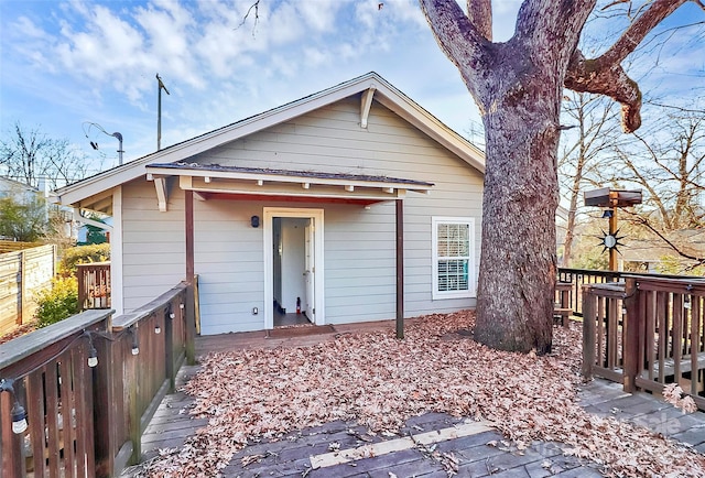 rear view of house with a deck