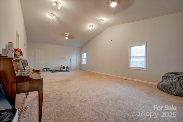 bonus room with lofted ceiling, baseboards, and carpet flooring