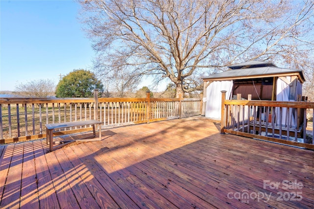 deck with an outbuilding