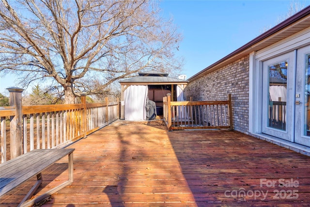 wooden deck with a gazebo