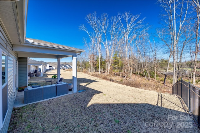 view of yard featuring a patio area and outdoor lounge area