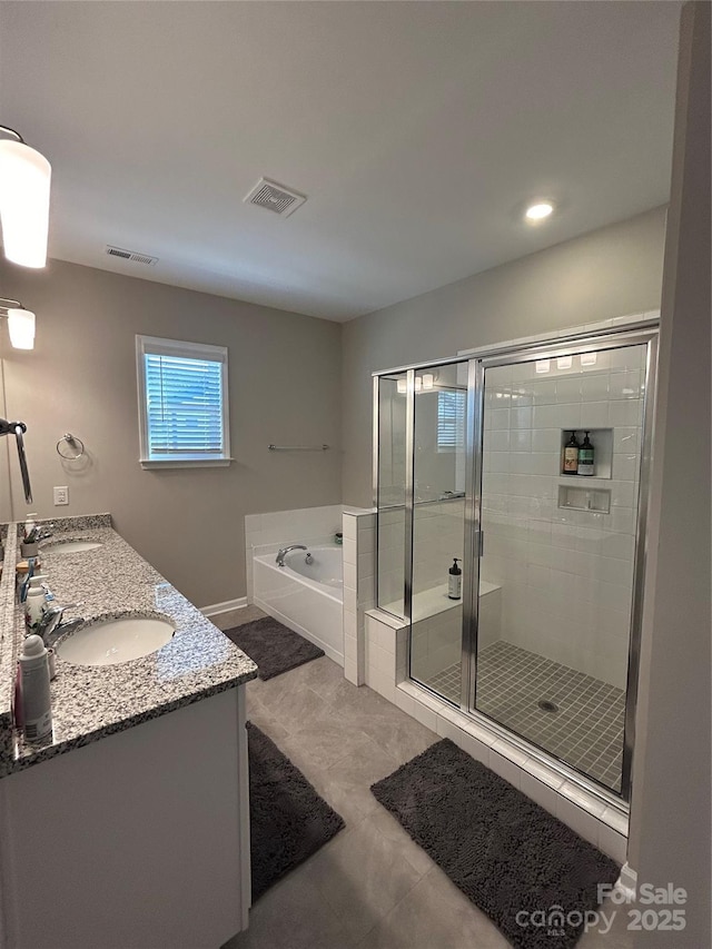 bathroom featuring separate shower and tub and vanity