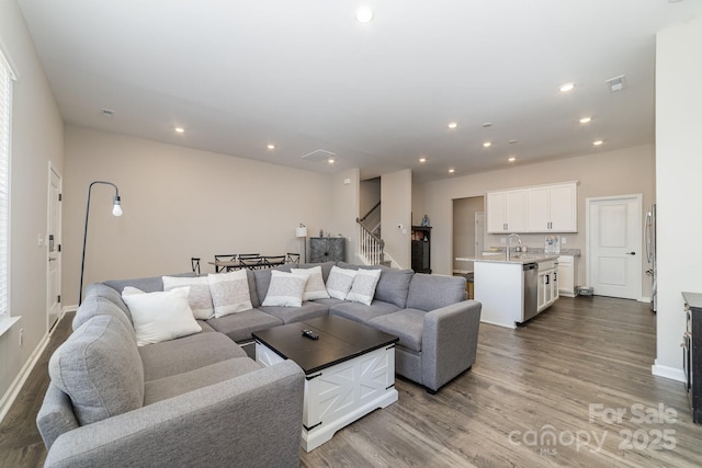 living room with light hardwood / wood-style floors