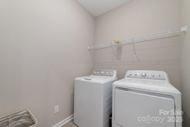 laundry room featuring separate washer and dryer