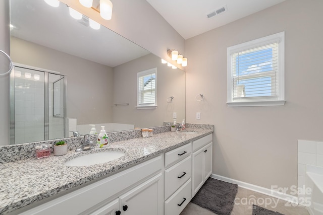 bathroom featuring vanity and separate shower and tub