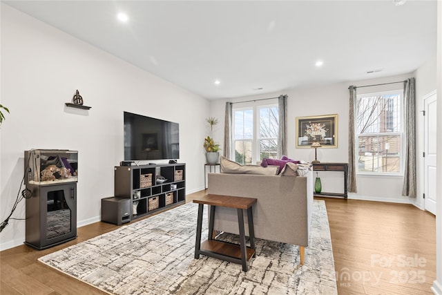 living room with hardwood / wood-style flooring