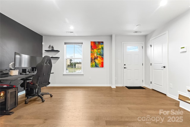 home office featuring light hardwood / wood-style floors