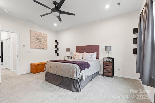 carpeted bedroom with ceiling fan