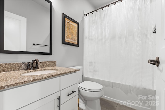 full bathroom featuring shower / bath combination with curtain, vanity, toilet, and tile patterned flooring