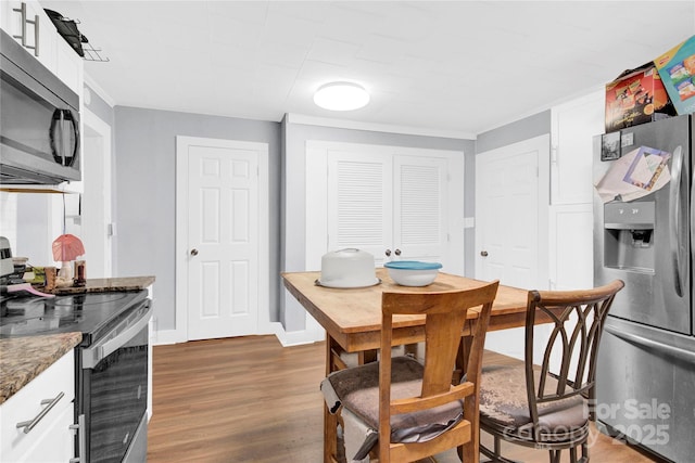 dining room featuring dark hardwood / wood-style floors