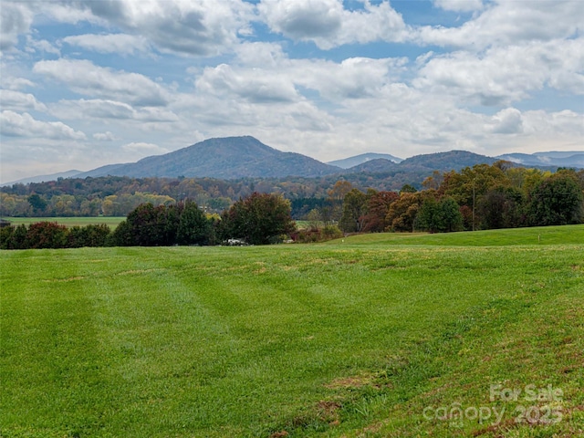 view of mountain feature with a rural view