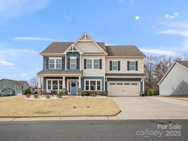 craftsman house with a garage