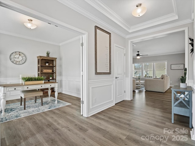 hall featuring crown molding and hardwood / wood-style floors