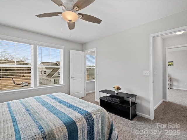 carpeted bedroom featuring ceiling fan