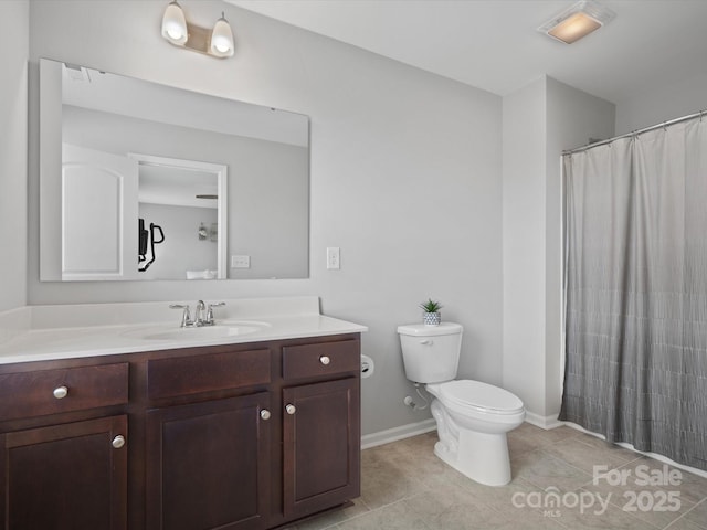 bathroom featuring vanity, toilet, curtained shower, and tile patterned flooring