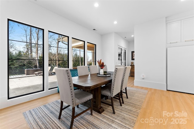 dining area featuring light hardwood / wood-style floors