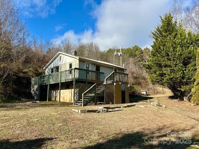 rear view of property with a deck